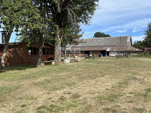 Venta de casa y galpón/ 5 min. del Tepual/orilla carret.