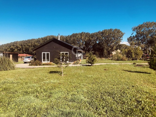 Casa en Parcela Frutillar con invernadero y jardín
